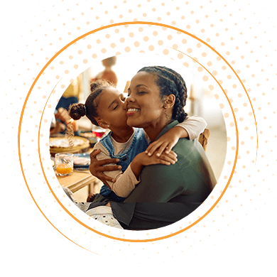 little girl kissing mom on cheek